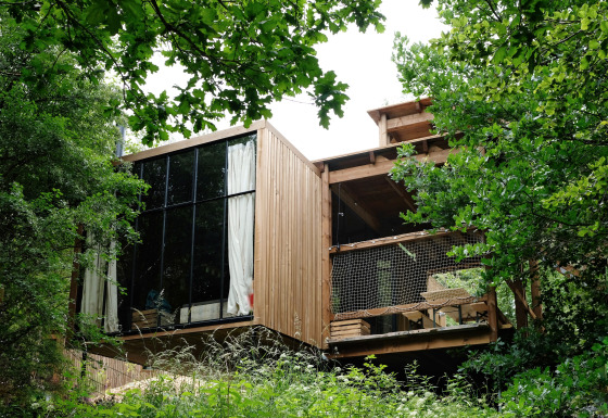Nutchel - Lodges in de Ardennen, België. Moderne houten glamping accommodatie te midden van groene natuur.