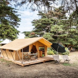 Glamping accommodation at Huttopia Ars-en-Ré featuring spacious tents and natural surroundings, Nouvelle-Aquitaine.