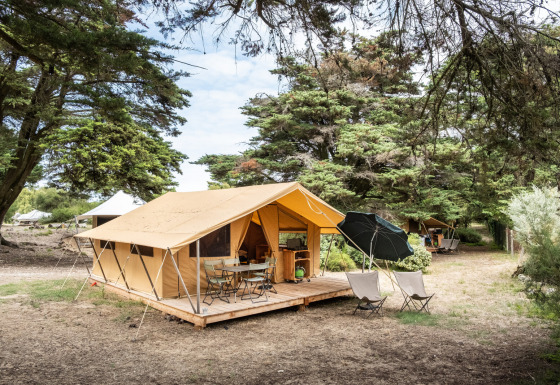 Glamping accommodation at Huttopia Ars-en-Ré featuring spacious tents and natural surroundings, Nouvelle-Aquitaine.