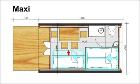 Plan d'une tente Maxi glamping au Campingpark Rerik, montrant lits, salle de bain et coin repas.