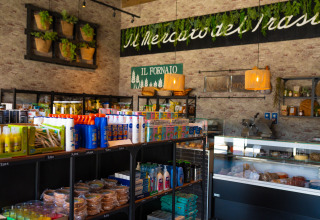 Small market inside Trasimeno Glamping Resort offering fresh foods, groceries, local products and delicacies.