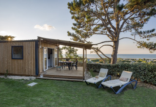 Glamping accommodation at Camping Saint Pabu Plage - Glamping Bretagne with sea view, terrace, and loungers