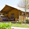 Glamping accommodation at Vacanze col Cuore: Trasimeno Glamping Resort - Safaritenten Umbrië in a scenic setting.