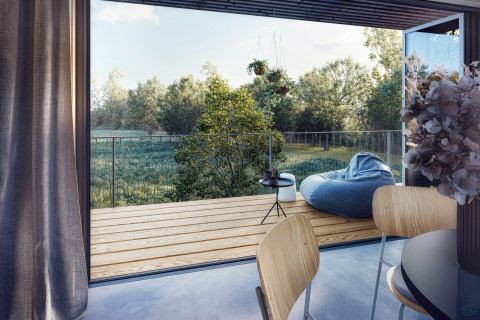 Glampingaccommodatie Ostsee Baumhaus aan de Oostzee met terras, zitzak, en uitzicht op de natuur.