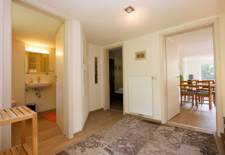 Interior view of luxurious glamping accommodation at Camping Isny, Baden-Württemberg, featuring a bright hallway.