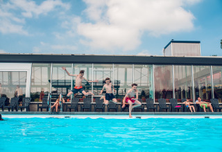 Youngsters by pool - Ackersate Villatent - Voorthuizen, Gelderland, Netherlands