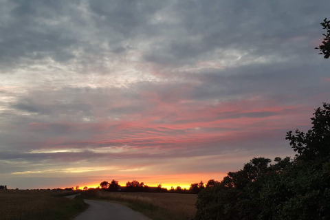 Prachtige zonsondergang bij een vijfsterren vakantiewoning in Sydals, Denemarken, met kleurrijke lucht.