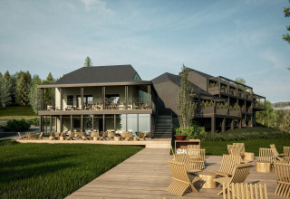 Buitenaanzicht van Hillview Resort Grandvoir 1 cabine in België, met moderne houten architectuur en terrassen.