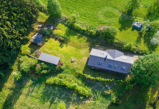 Vista aerea dello chalet Lomnice nad Popelkou LLB005 circondato da verde e natura nella Repubblica Ceca.