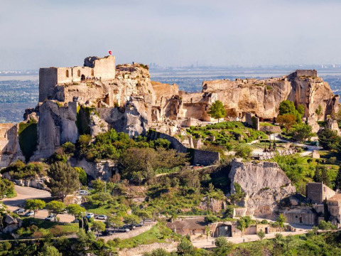 View of ancient ruins surrounded by greenery at Campsite La Vallée Heureuse, Provence-Alpes-Côte d’Azur, France.