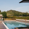 Outdoor swimming pool at Wecamp San Sebastián holiday park with hill views in the Basque Country, Spain.
