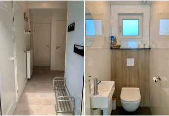 Entree en modern toilet in een chalet in Nederland met minimalistisch, licht interieur en strak design.