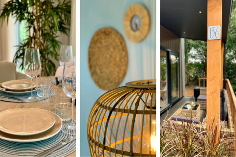 Chalet moderno con terrazza e veranda nei Paesi Bassi, tavola apparecchiata, lampada e area esterna.