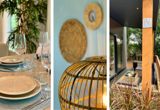 Modernes Chalet mit Veranda in den Niederlanden, gedeckter Tisch, Lampe und Terrasse mit Sitzbereich.