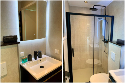 Modernes Badezimmer im Pleasant chalet mit Dusche, Waschbecken, Spiegel und WC in den Niederlanden.