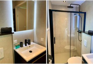 Bagno moderno nello chalet Pleasant con doccia, lavandino, specchio e WC nei Paesi Bassi.