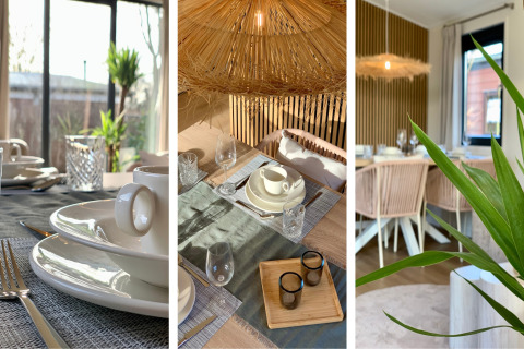 Spisebord i strandhus Chalet i Sint Maartenszee nær Sandy Beach, med sollys og naturinspireret dekoration.