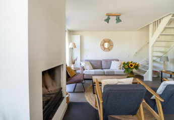 Bright living room in the Holiday home Waterland for six Person in the Netherlands, modern and cozy.