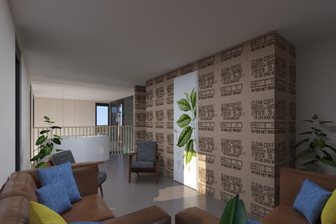 Living room at Sea Lodges Zandvoort 11 with modern sofa, coffee sack wall decor, and green plants.