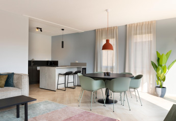 Modern living and kitchen area at Resort Nieuwvliet-Bad 13 in the Netherlands, stylish decor and bright light.