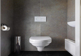 Modern wall-mounted toilet in a minimalist bathroom at Holiday Park «Latour 8» in the Netherlands.