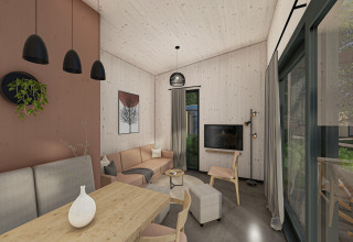 Modernes Wohnzimmer im Holiday Park «Klein Vink 25» in den Niederlanden mit großen Fenstern.