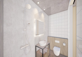 Moderne badeværelse med brusekabine, håndvask, spejl og toilet i Resort Gulpen 5, Holland.