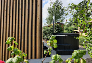 Outdoor area at Wetland Cabin for 2 at Boetiekpark de Kas, Scherpenzeel, Friesland, Netherlands.
