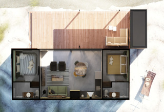 Bovenaanzicht van Sea Lodges Ameland 3 strandhuis in Nederland met twee slaapkamers en een houten terras.