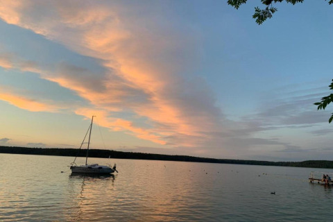 Solnedgang over sø ved Holiday home 