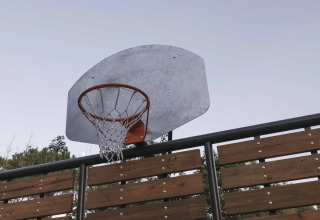Basketball hoop and wooden panels at Wecamp Santa Cristina holiday park in Catalonia, Spain.
