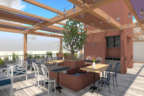 Udendørs terrasse på Beach Resort «Agde 2» i Frankrig med træsæder og udsigt over landskabet.