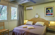 Bedroom in Holiday Resort Riva degli Etruschi San Vincenzo mobile home, featuring a double bed and natural light.