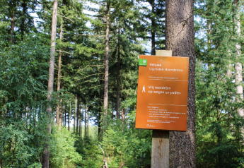 Sign at Veluwe Ugchelen Hoenderloo forest, near Holiday Park De Rimboe & De Woeste Hoogte 25 in the Netherlands.