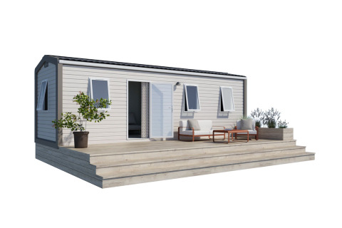 Next L Titania lodge met terrasmeubilair op Trasimeno Glamping Resort in Italië, moderne uitstraling bij daglicht.