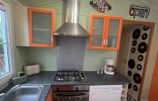 Kitchen in Premium Mobile Home at Campsite Les Franquettes in France, decorated in a retro diner style.