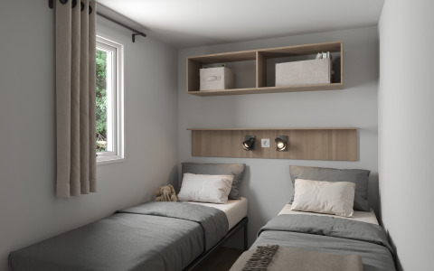 Two single beds in a modern room with a window, shelves, and reading lights at a French lodge accommodation.