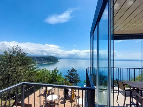 Scenic balcony view of the sea at Village Mare Pineta campsite in Friuli-Venezia Giulia, Italy.