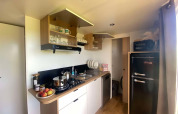 Modern kitchen in a two-bedroom cottage at Campsite Seasonova Lac de Bournazel, France.