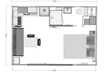 Floor plan of a glamping accommodation featuring bedroom, bathroom, kitchen, and shared dining space.