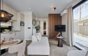 Modern living area at Happy Oak wellnesslodge, Holiday park Mölke, Netherlands, with bright, cozy interior.