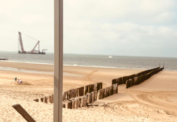 Ausblick vom Beach sleep house «Dishoek 37» in Zeeland, Niederlande, mit Sandstrand und Meerblick.