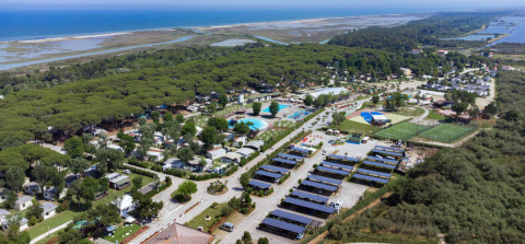 Aerial view of Spina Family Collection campsite in Emilia-Romagna, Italy, near the sea with forest surroundings.
