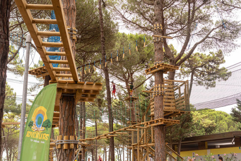 Tree top adventure park at Spina Family Collection campsite, a holiday park in Emilia-Romagna, Italy.