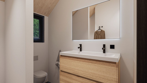 Bagno moderno con doppio lavabo, grande specchio e WC all’Eco Boslodge Jacuzzi nei Paesi Bassi.
