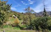 Uitzicht op het landschap bij Safaritent onderste terras op Camping Pian d'Amora in Italië.