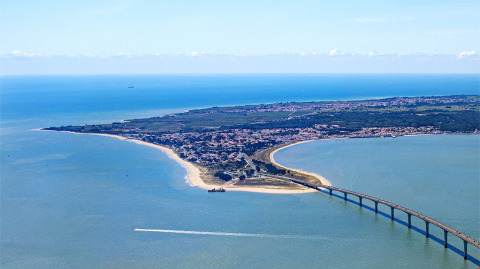 Aerial view of Rivedoux-Plage on Île de Ré, France, showing the bridge connecting the island to the mainland.
