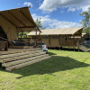 Glamping accommodation with safari tents at Azur Camping Wertheim am Main in Baden-Württemberg, grassy area.