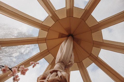Inside view looking up at the ceiling of a Lotus Belle tent at De Achterste Hoef park in the Netherlands.