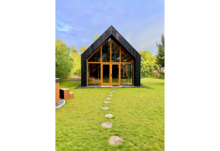 Lodge moderna Forest villa «De Bosburcht» a De Kremmer nei Paesi Bassi, circondata dal verde e dalla natura.